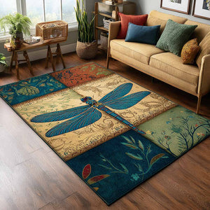 Botanical Wings Area Rug – a blue dragonfly across botanical patchwork-style panels in cream, blue and green