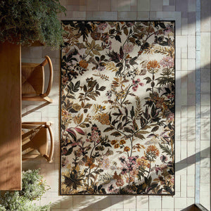 Soft Botanica Area Rug – delicate leafy stems and small flowers on a warm cream ground